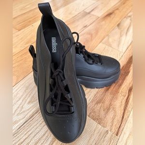 New Melissa black sneakers.